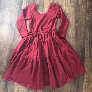 Alice + Ames twirling dress with tiered bottom.